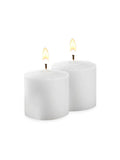 //www.yummicandles.com/cdn/shop/products/21000-10hr-white-votive-candles-l_077bc080-315f-4190-b5a1-b1192816b41e_compact.jpg?v=1519806200